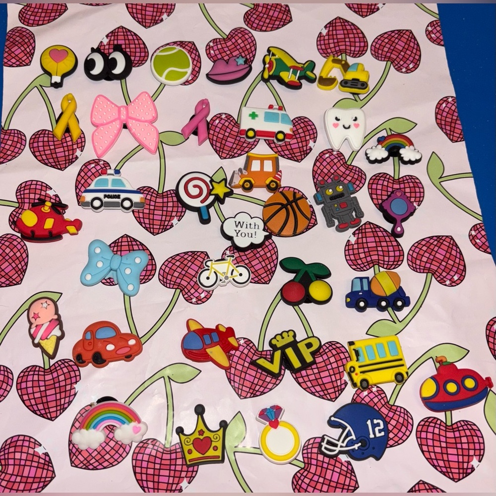 34 assorted croc charms